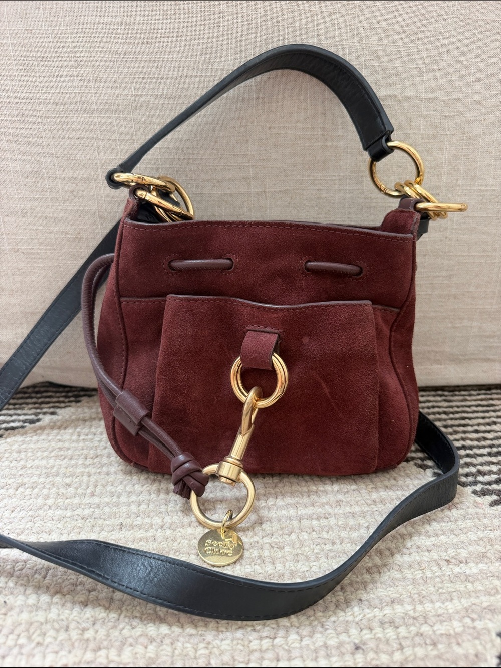 See By Chloé Burgundy Suede Shoulder Bag with Black Strap and gold hardware